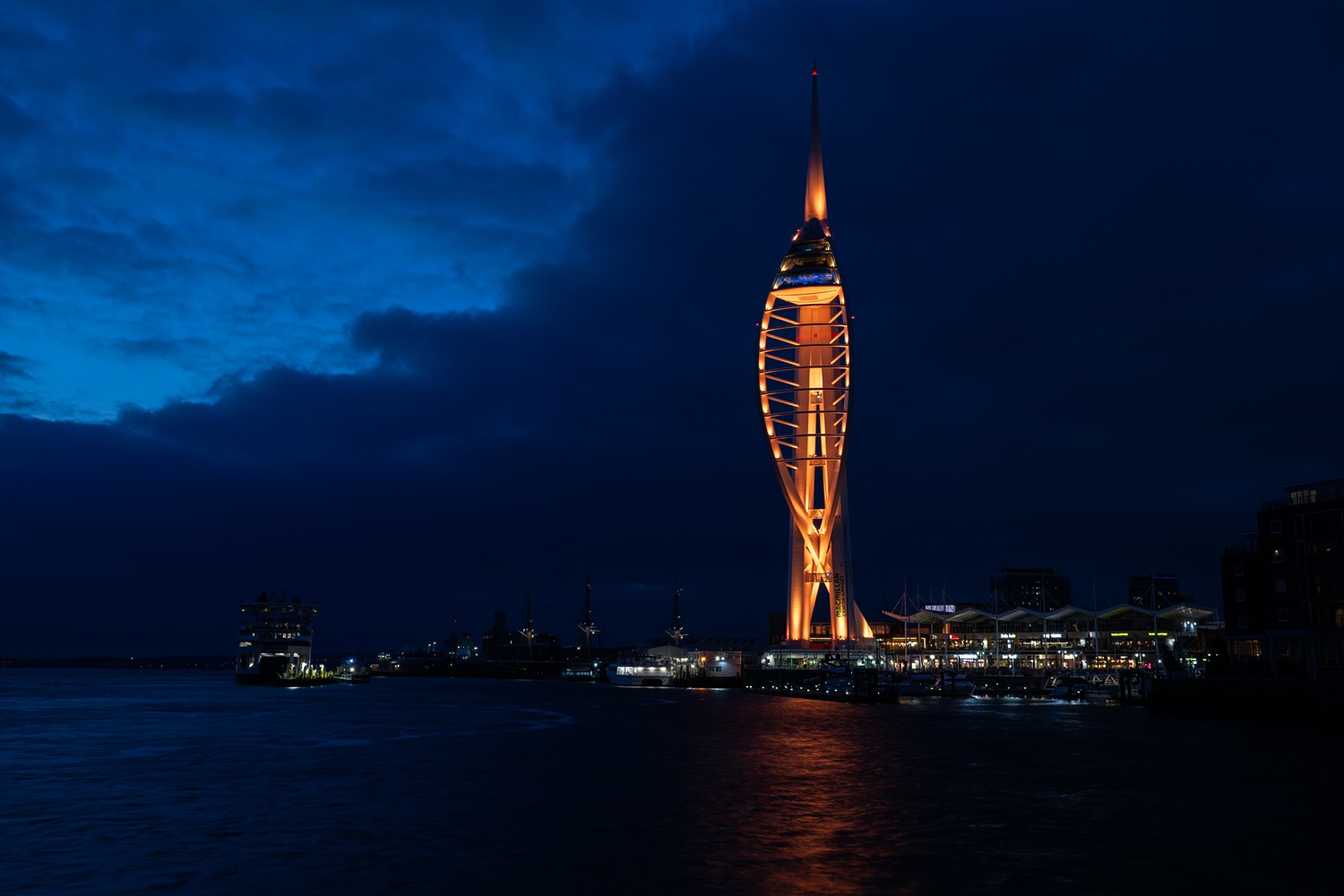 spinnaker tower lit up orange