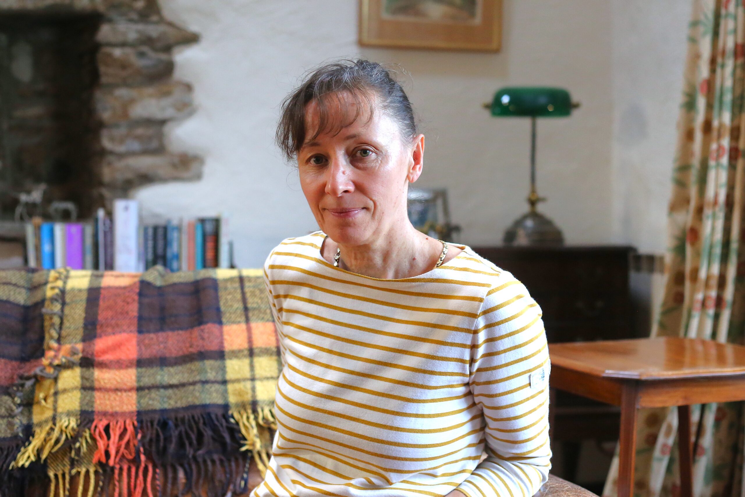 Dr Bern sitting on the sofa